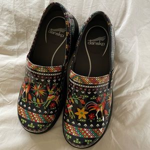 Perfect Dansko clogs size 37 with charming details.